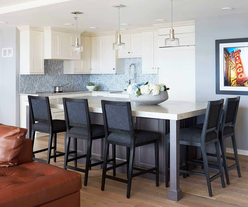 dark wood island white perimeter cabinets